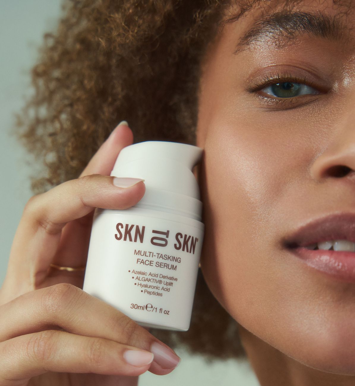 multi tasking face serum bottle